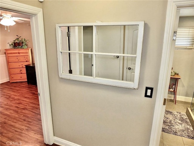 room details with ceiling fan and wood-type flooring