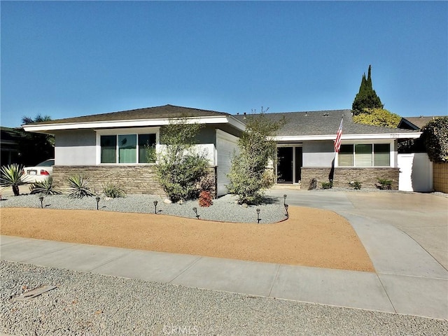 single story home featuring a garage