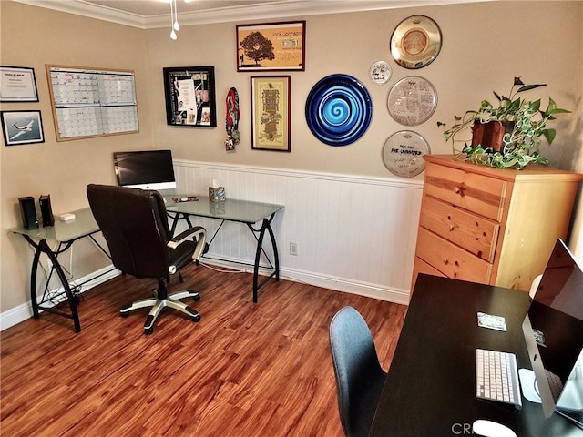 office featuring hardwood / wood-style flooring and crown molding