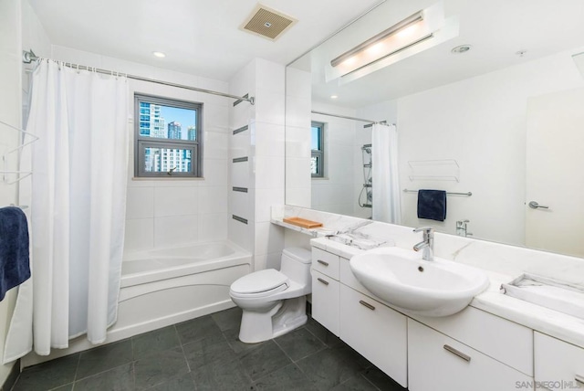 full bathroom featuring toilet, shower / tub combo, vanity, and tile patterned floors