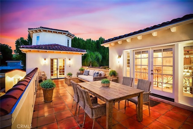 exterior space featuring french doors, an outdoor hangout area, and a patio area