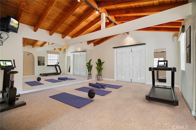 workout room with carpet, wood ceiling, and vaulted ceiling