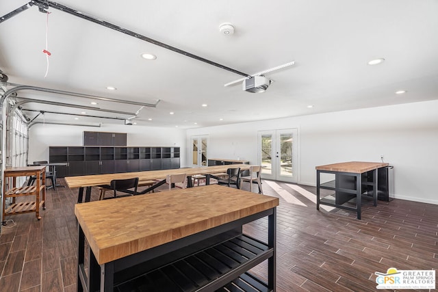 dining area with french doors and dark wood-type flooring