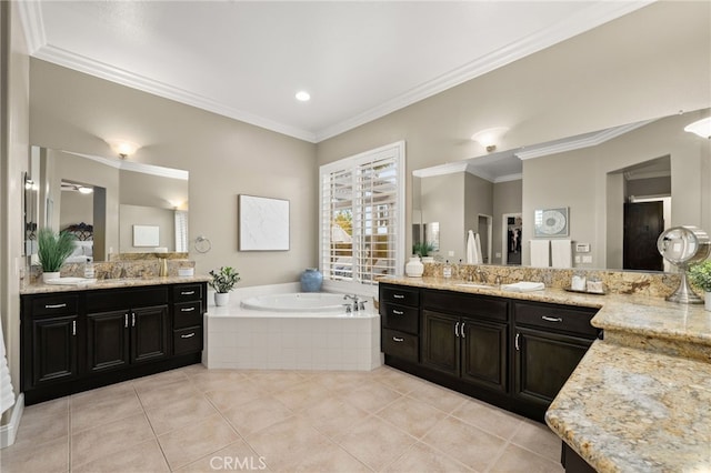 bathroom featuring tile patterned flooring, vanity, a relaxing tiled tub, and crown molding