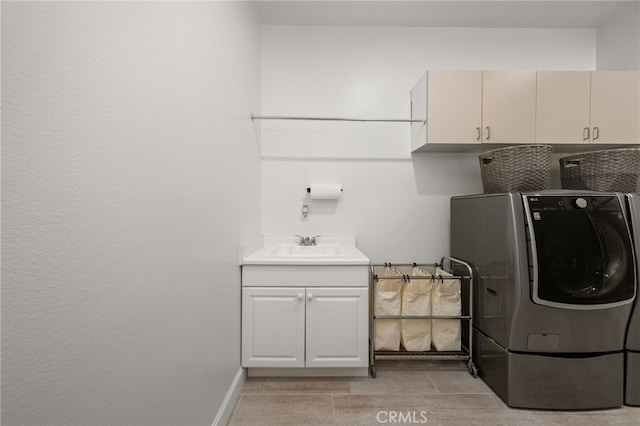 washroom featuring cabinets and sink