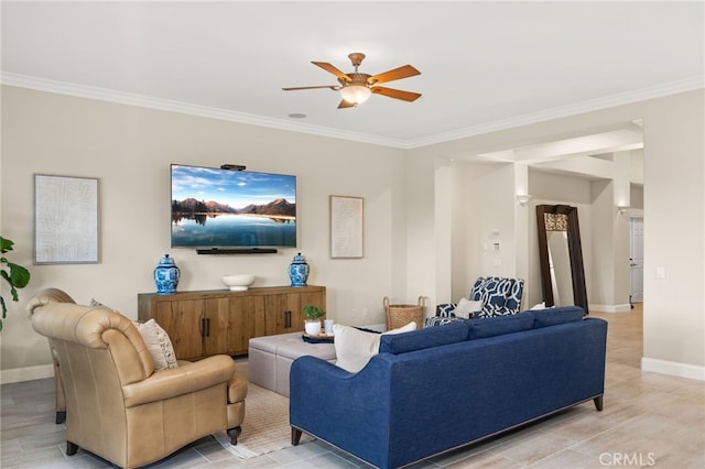 living room featuring light hardwood / wood-style flooring, ceiling fan, and crown molding