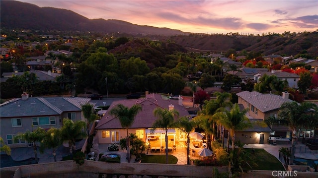 aerial view at dusk with a mountain view