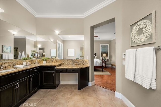 bathroom featuring crown molding, hardwood / wood-style floors, vanity, and ceiling fan