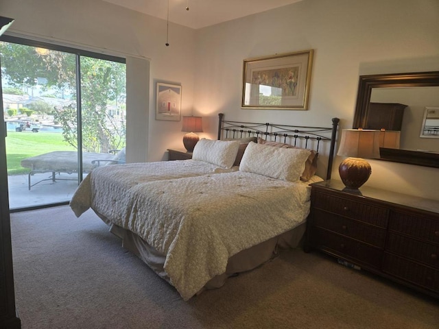 bedroom featuring carpet flooring and access to outside