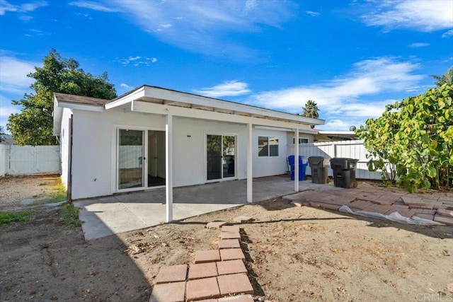 rear view of property with a patio area