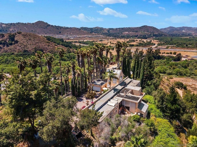 drone / aerial view featuring a mountain view