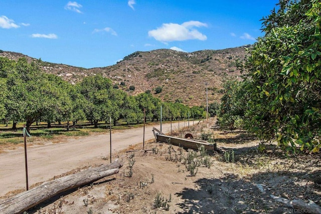 property view of mountains featuring a rural view