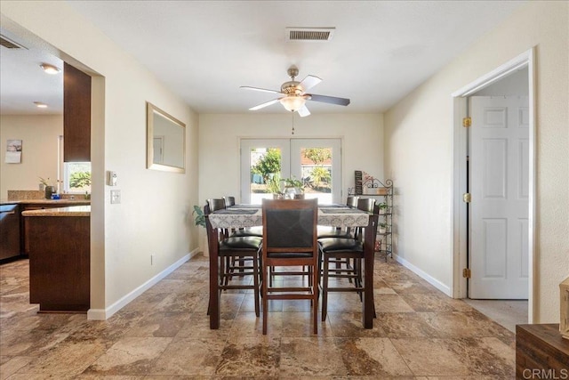 dining space with ceiling fan