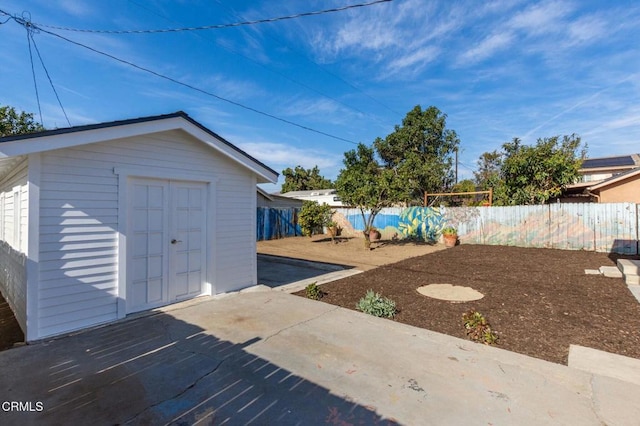 exterior space featuring an outbuilding and a patio