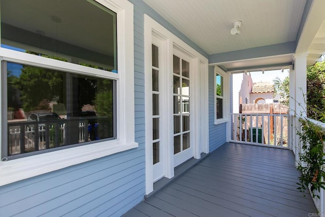 wooden terrace with covered porch