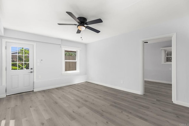 interior space featuring hardwood / wood-style floors and ceiling fan