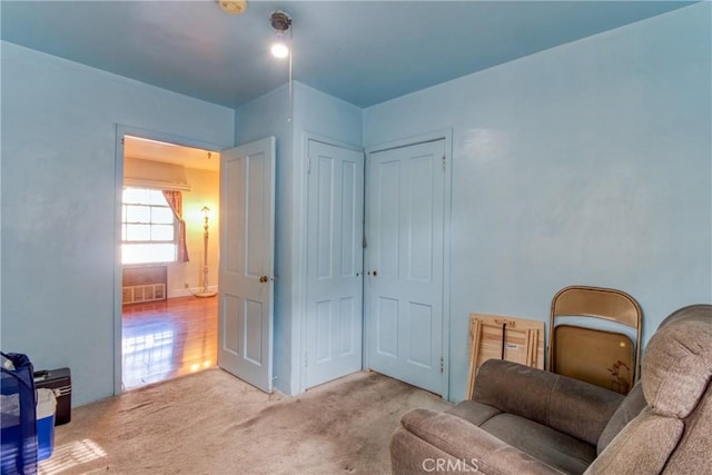 sitting room with light carpet