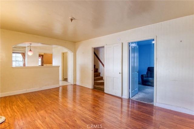 empty room featuring wood-type flooring