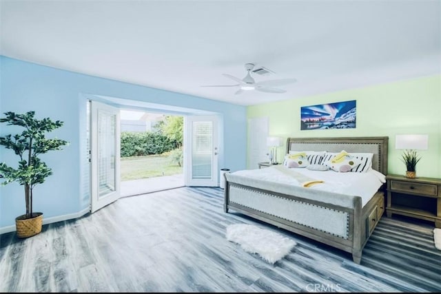 bedroom featuring access to exterior, hardwood / wood-style floors, and ceiling fan