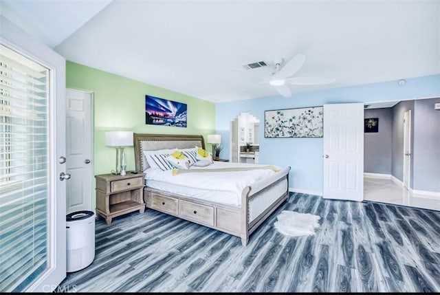 bedroom featuring ceiling fan and dark hardwood / wood-style flooring