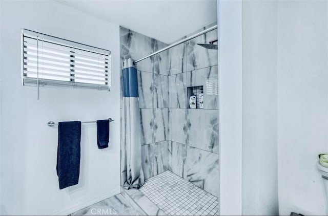 bathroom featuring curtained shower