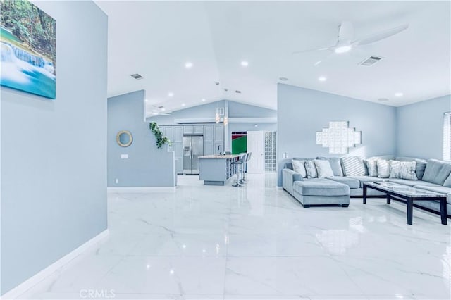 living room with vaulted ceiling and ceiling fan