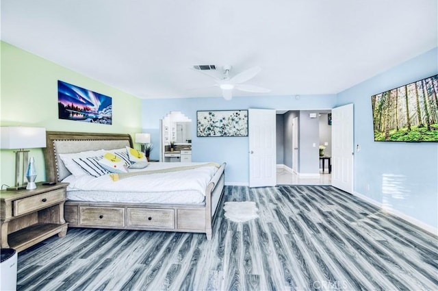 bedroom featuring hardwood / wood-style flooring and ceiling fan