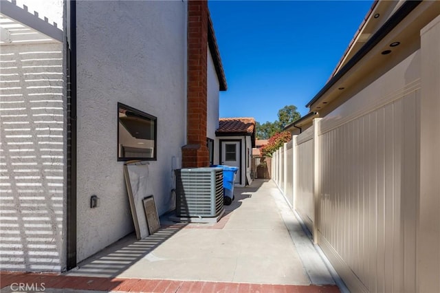 view of patio / terrace with central AC unit