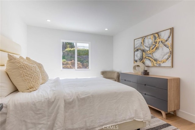 bedroom featuring light hardwood / wood-style flooring