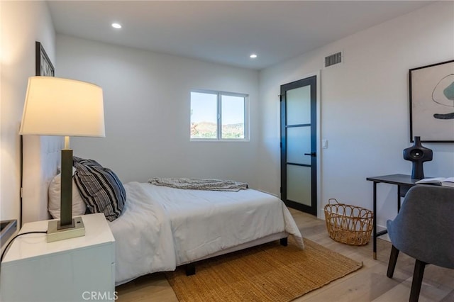 bedroom featuring light hardwood / wood-style flooring