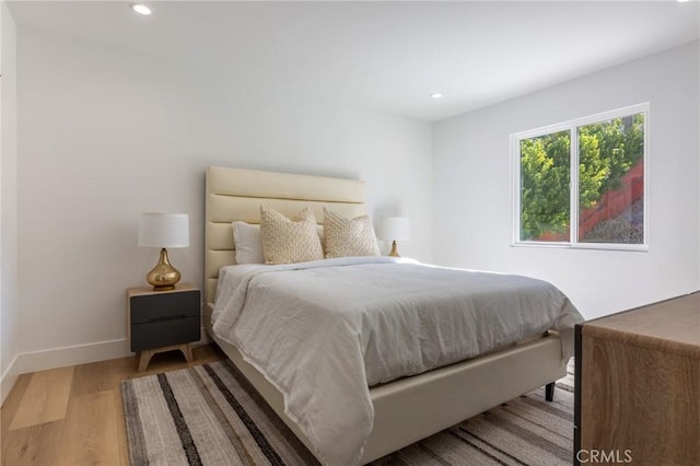 bedroom featuring wood-type flooring