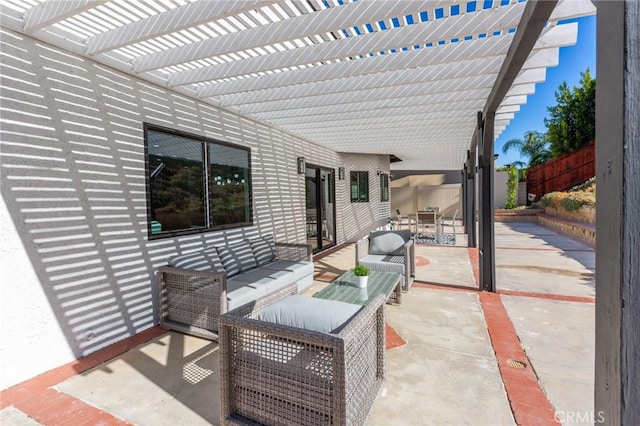 view of patio with an outdoor hangout area and a pergola