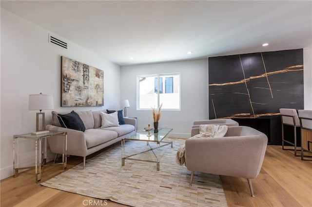 living room with hardwood / wood-style floors