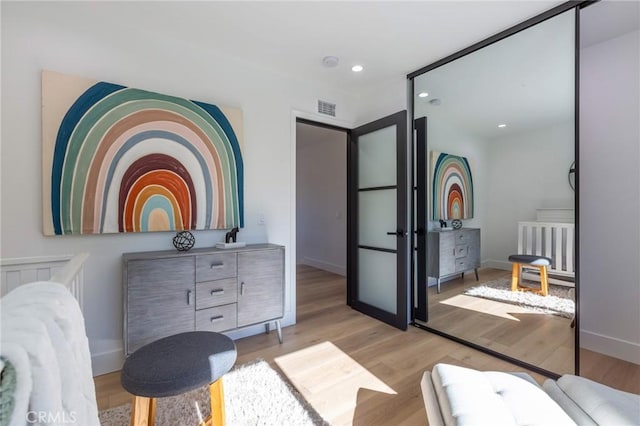 bedroom featuring light wood-type flooring