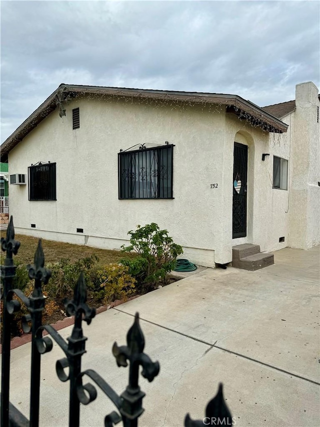 view of front of property with a patio