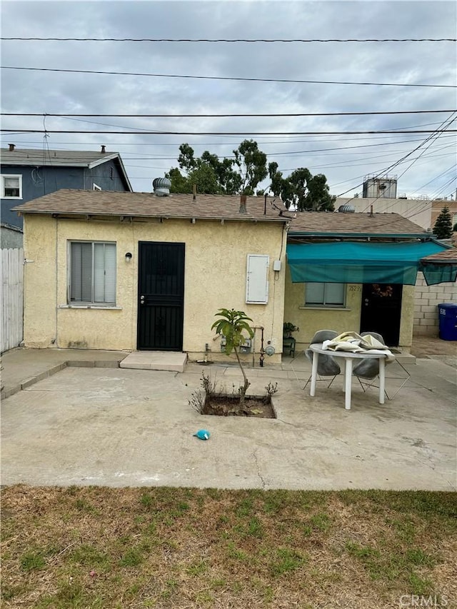 rear view of house featuring a patio area