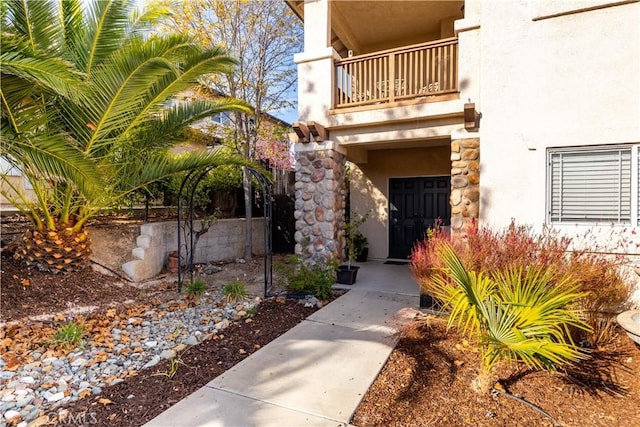 doorway to property with a balcony