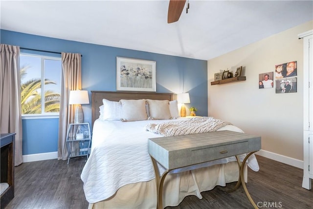 bedroom with dark wood-type flooring and ceiling fan