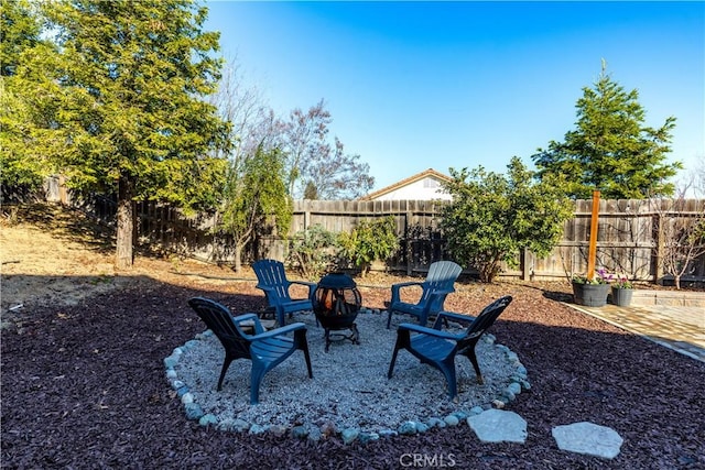 view of yard featuring a fire pit