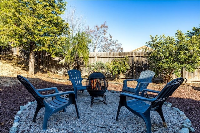 view of patio / terrace with a fire pit