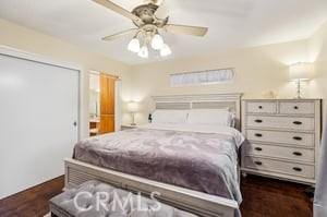 bedroom featuring ceiling fan and dark hardwood / wood-style flooring