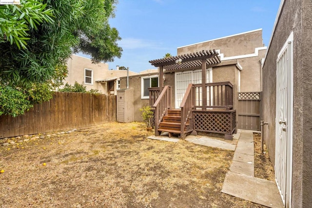 back of house with a pergola