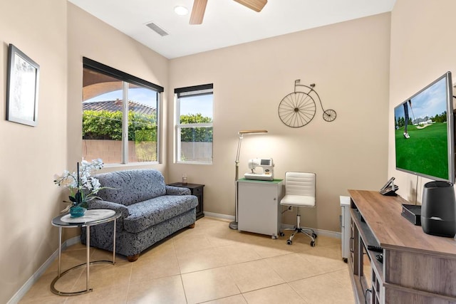 office with ceiling fan and light tile patterned floors