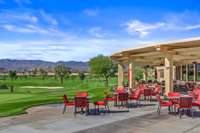 view of patio / terrace featuring a mountain view