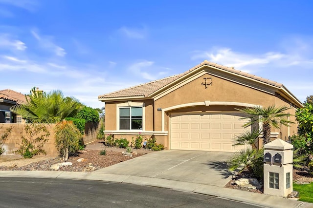 view of front of property with a garage