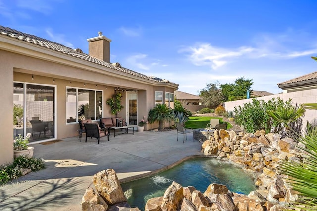 view of patio / terrace with an outdoor hangout area