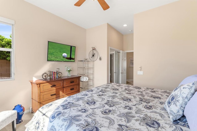 carpeted bedroom with ceiling fan