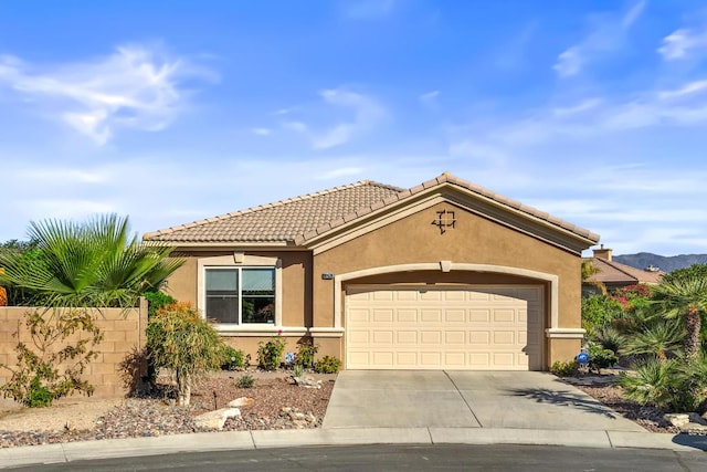 view of front of property with a garage