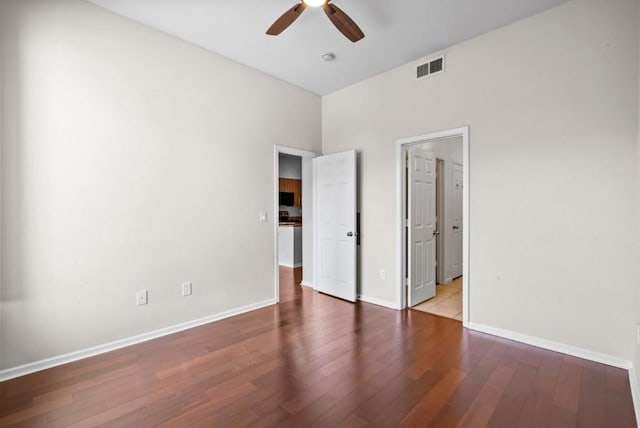 unfurnished bedroom featuring ceiling fan and light hardwood / wood-style floors