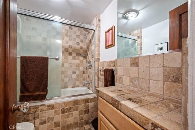 bathroom featuring enclosed tub / shower combo